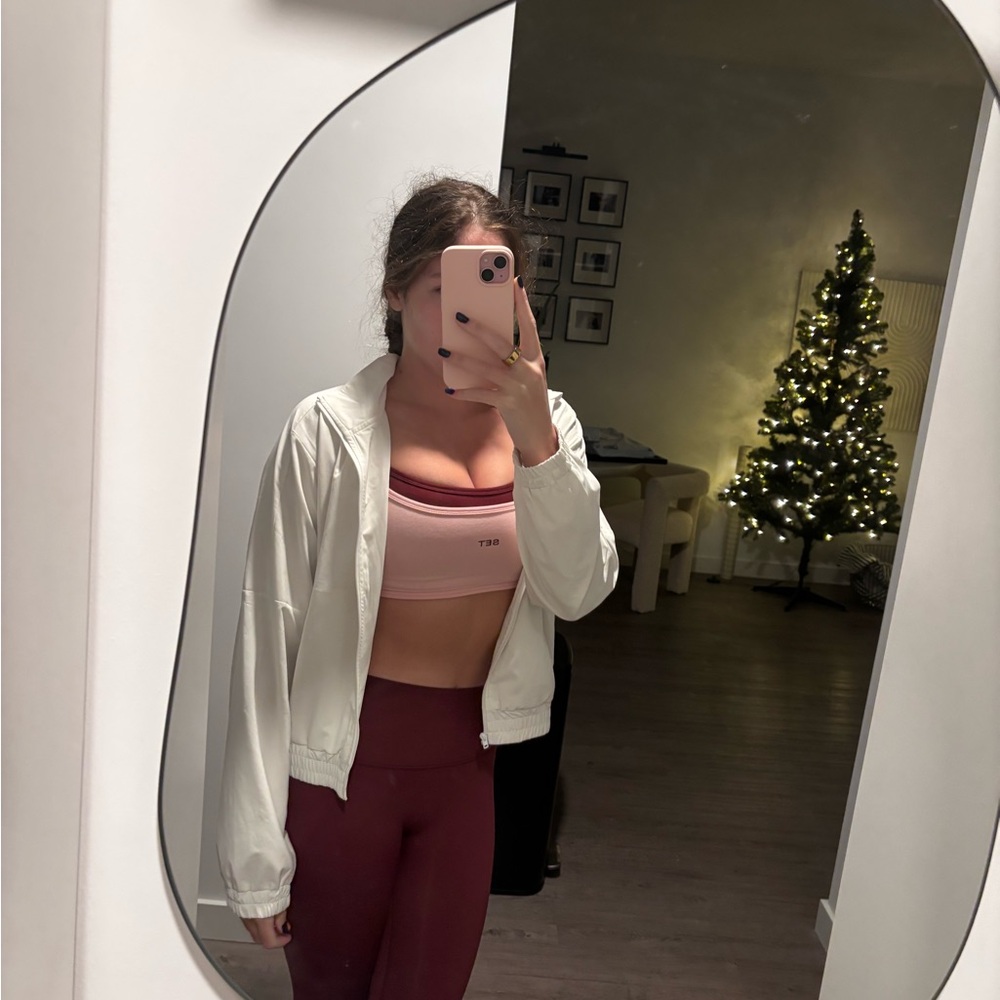 White tna Aritzia jacket perfect to throw over all your cute workout sets!